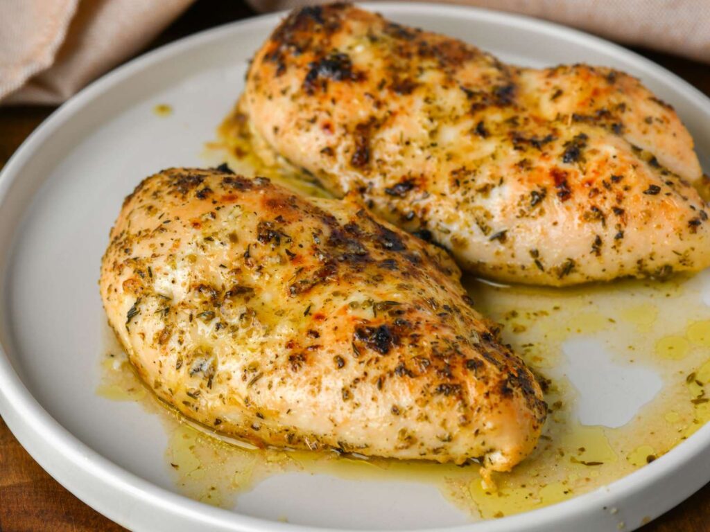 Dishes 260445easy mediterranean baked chicken breastkimvideo4x3 6fc05b993afe4da5846bdc13a9861844